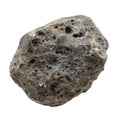 A large rock with many holes in it Royalty Free Stock Photo