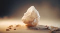 A large rock sitting on the ground with sand, AI