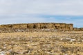 Large rock wall along desert vista landscape in rural New Mexico Royalty Free Stock Photo