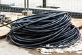 A large roll of industrial cable for the installation of electrical networks. City street lighting system construction. Close-up Royalty Free Stock Photo