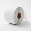 Large Roll of White Paper on a Light Gray Surface with Soft Shadows paper roll printing Royalty Free Stock Photo