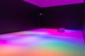 Large room bathed in colourful lights, Abstract Aotearoa exhibition, Te Papa Museum in Wellington, New Zealand