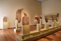 Large room with Egyptian artifacts set on pedestals, Cleveland Art Museum, Ohio, 2016