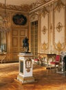 Large room, sculpture and chandelier at Versailles Palace