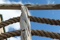 Large ropes , stones and walls and blue sky