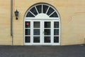 Large round arch door with rungs Royalty Free Stock Photo