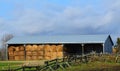 Large Round Bales in Storage Shed Royalty Free Stock Photo