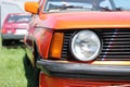 Large round headlight of a rare German sports car BMW E21.