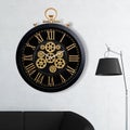 A large round indoor clock on the wall. Big clock on metal rack Royalty Free Stock Photo