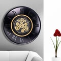 A large round indoor clock on the wall. Big clock on metal rack Royalty Free Stock Photo