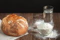 Large round loaf with bread products Royalty Free Stock Photo