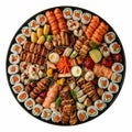 Large Round Platter Filled With Assorted Sushi Rolls Cooked Meats And Seafood salmon Royalty Free Stock Photo