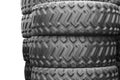 Large rubber tires for trucks lying on the street. Black tires close up with a large tread on the ground Royalty Free Stock Photo