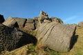 large rugged gritstone outcrop at the bridestones a large rock formation in west yorkshire near todmordenwith blue sky and Royalty Free Stock Photo