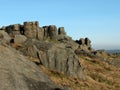 large rugged gritstone outcrop at the bridestones a large rock formation in west yorkshire near todmordenwith blue sky and Royalty Free Stock Photo