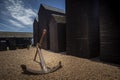 Large rusted anchor outside smokehouses in Hastings