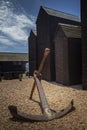 Large rusted anchor outside smokehouses in Hastings