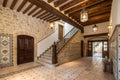 Large rustic interior hallway and stairs of large Spanish Villa Royalty Free Stock Photo