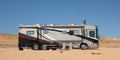 A luxury motor home parked at lake powell on memorial day weekend Royalty Free Stock Photo