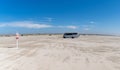 Large RV parked on an endless golden sandy beach on the Wadden Sea islands of western Denmark Royalty Free Stock Photo