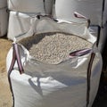 Large sacks of aggregates for making concrete mixes.