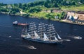 A large sailboat goes along the water area of the Daugava River.nThe last windjammer bark Kruzenstern.