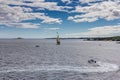 A large sailing frigate, barque or brig sails on a calm sea