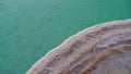 Large Salt accumulated on the shore of the Dead sea. Deposits of mineral salts, typical landscape of the Dead Sea. Salt on beach