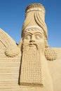 Large sand sculpture of Lamassu deity Royalty Free Stock Photo