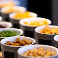 Large savoury snack food selection in porcelain bowls