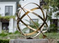 Large scale garden armillary sundial sphere with roman numerals Royalty Free Stock Photo