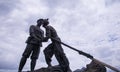 large-scale sculpture of military and civilian fish and water, Shigu Town, the first bay of the Yangtze River. Royalty Free Stock Photo