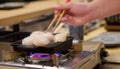 Large scallops on the grill. Enjoy Omakase experience at Japanese Sushi Restaurant