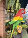 Large sculpture of a parrot on the street Royalty Free Stock Photo