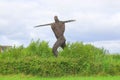 Willow sculpture of walking man