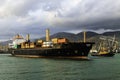 A large sea cargo ship container ship leaves the port. Royalty Free Stock Photo