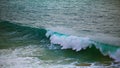 Large sea surf swelling breaking on shallow reef. Turquoise waves rolling coast Royalty Free Stock Photo