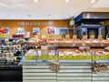 Large section with freshly baked bread and other sweet breakfast rolls in Rimi supermarket