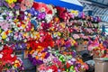 Large selection of artificial flowers and bouquets in the market. Royalty Free Stock Photo