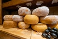 Large selection of cheese in local food shop Royalty Free Stock Photo