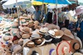 Large selection of hats in a market in Morocco.