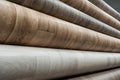 Rolls of new linoleum on the window of a hardware store. A large selection of linoleum