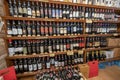 Large selection of locally made wine in Tuscany local food shop for tourists Royalty Free Stock Photo