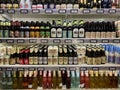 Large selection of low-alcohol drinks and beer on the shelves in the supermarket Royalty Free Stock Photo