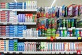 MINSK, BELARUS - August 28, 2019: A large selection of toothpastes, brushes and oral care products on shelves in the store.