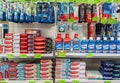 Large selection of toothpastes, brushes and oral care products on shelves in supermarket. Minsk, Belarus, 2022