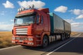 A large semi truck driving down a desert road during the day Royalty Free Stock Photo