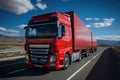 A large semi truck driving down a desert road during the day. European truck Royalty Free Stock Photo