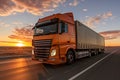 A large semi truck driving down a desert road at sunset. European truck