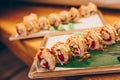 Large set of Sushi Rolls Warm Ebi Sake Unagi Spring. Assortment Philadelphia roll Dishes from Japanese raw fish in one plate in Royalty Free Stock Photo